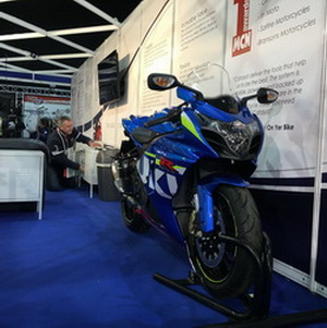 The Suzuki on the stand with Mike in the background.